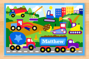 Construction vehicles, digger, bull dozer, crane and buildings.